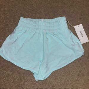 Athletic yoga running Women's Light Blue Shorts, size 2